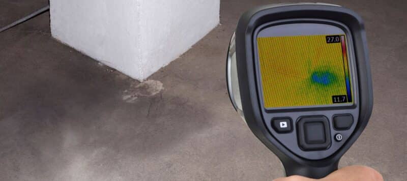 Thermal imaging device detecting moisture around a building's foundation