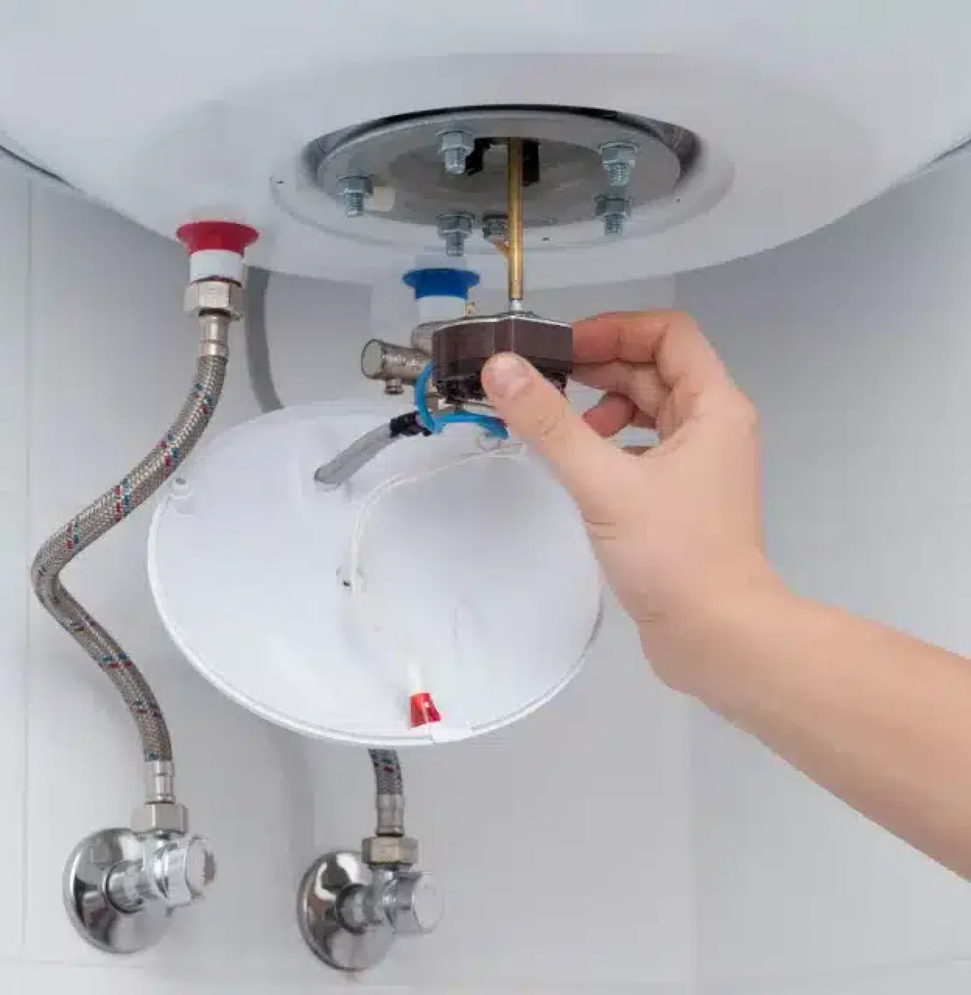 Plumbing technician at work Service Squad Plumbing