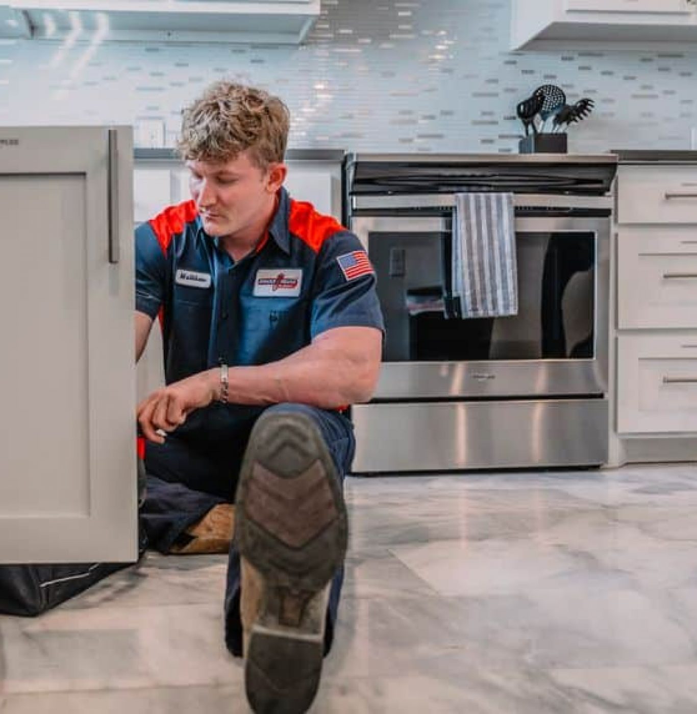 Technician using advanced leak detection equipment on a residential property in Burleson, TX